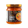 Jar of Siam Red Thai Curry Paste with gold lid on a white background